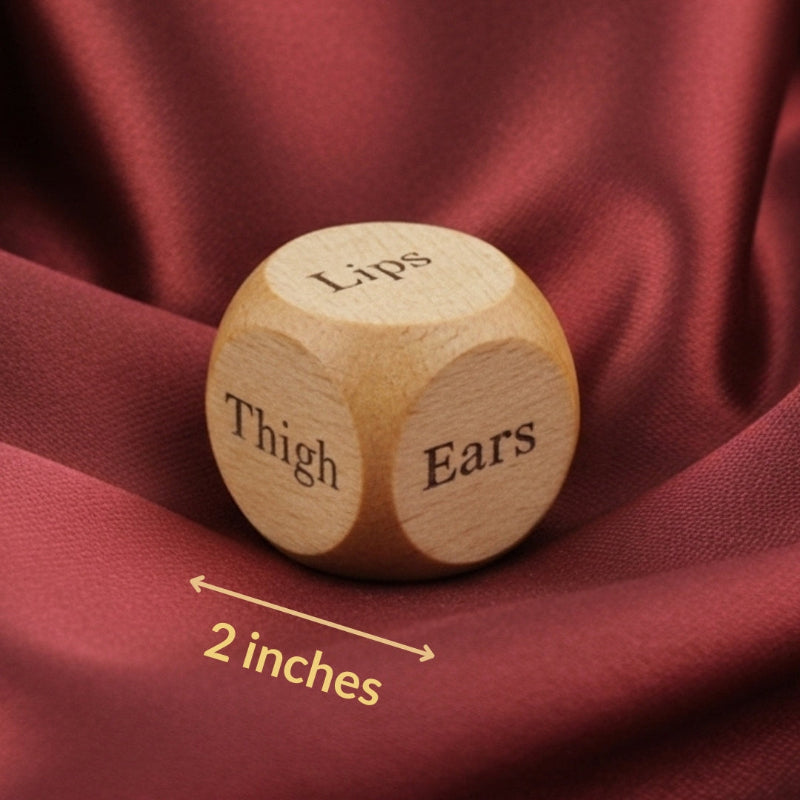 Wooden die with 'Lips', 'Thigh', and 'Ears' labels on a red fabric background

